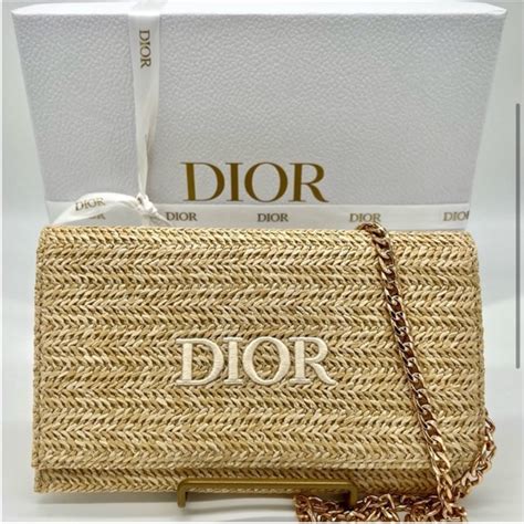 lady dior rafia|Dior raffia clutch bag.